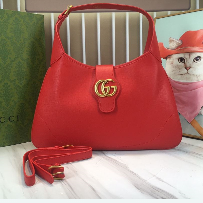 G*u*i top handle bags